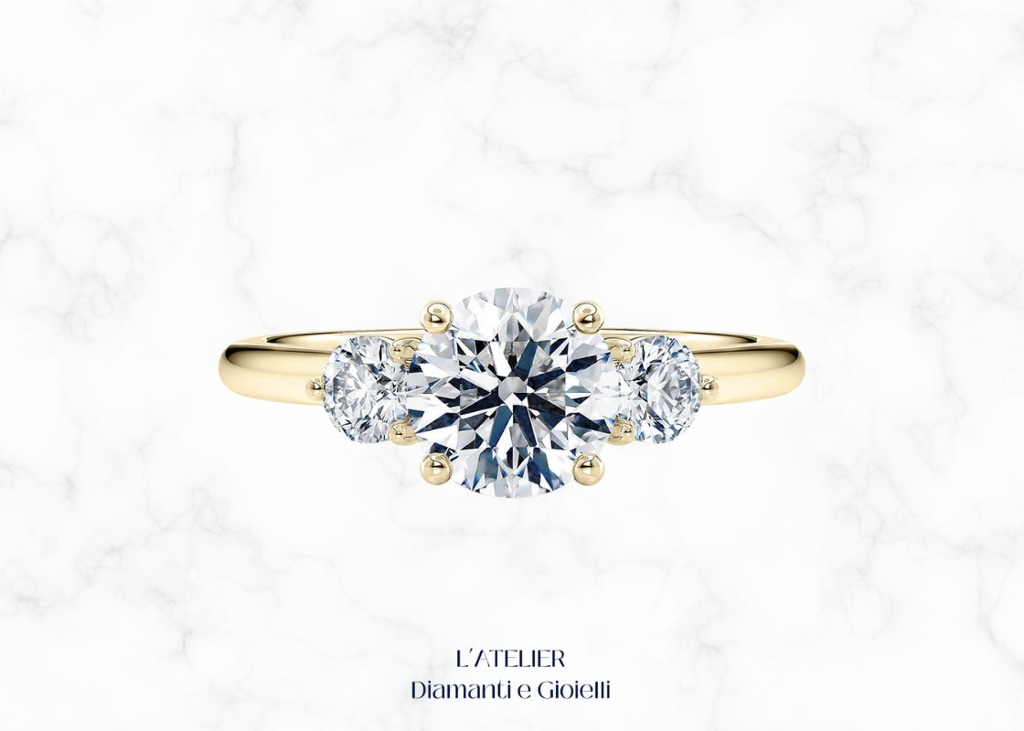 Lussuoso anello Trilogy 'Aurora' in oro 18 carati con tre diamanti brillanti allineati. Gioiello simbolo di passato, presente e futuro, ideale per un fidanzamento o anniversario.