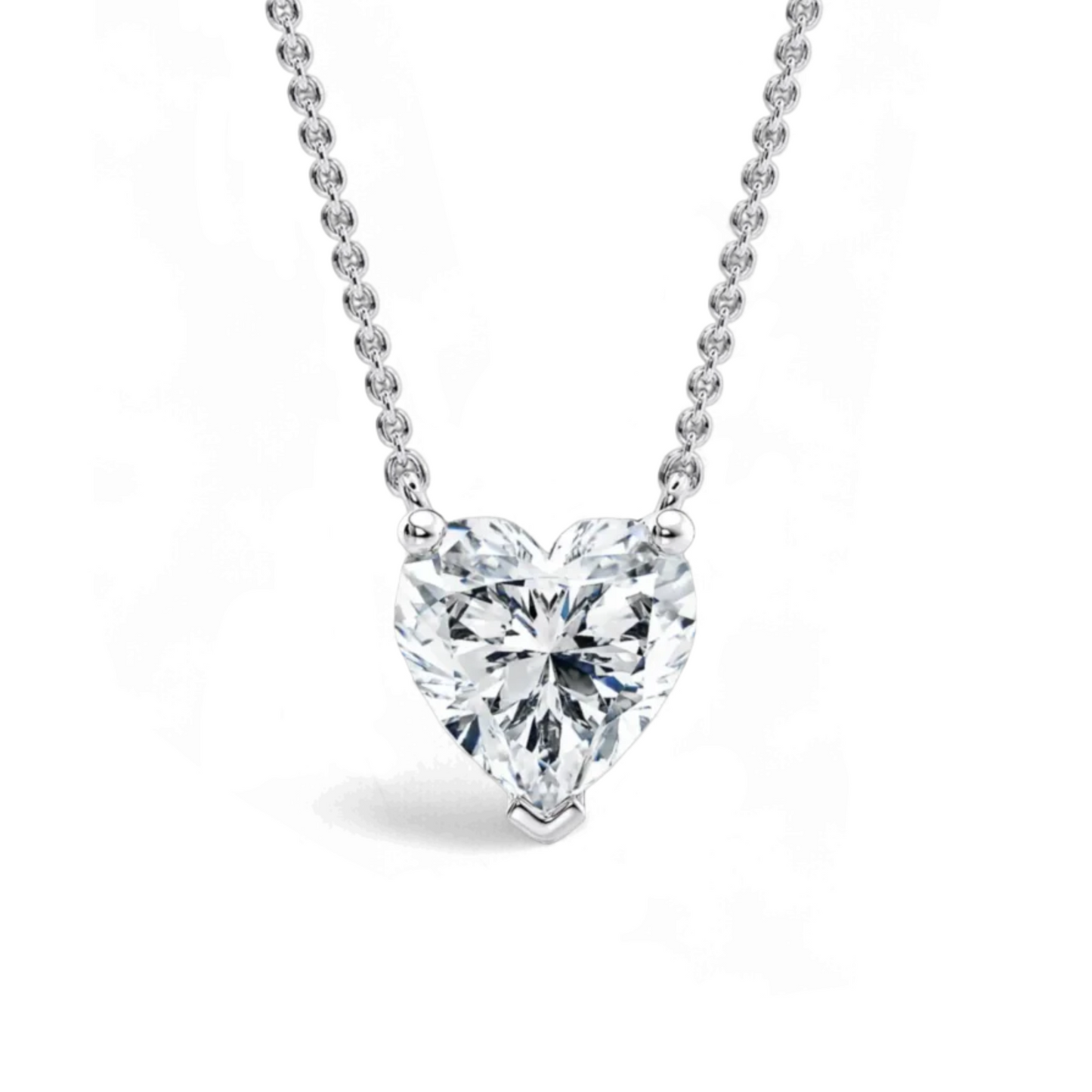 Elegante collana punto luce in oro 18 carati con un diamante a taglio cuore brillante. Gioiello romantico e simbolo d'amore