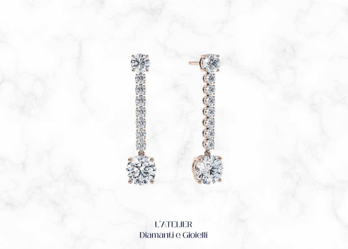 Eleganti orecchini pendenti in oro 18 carati con diamanti, che oscillano delicatamente. Gioielli di lusso e raffinatezza per ogni occasione.