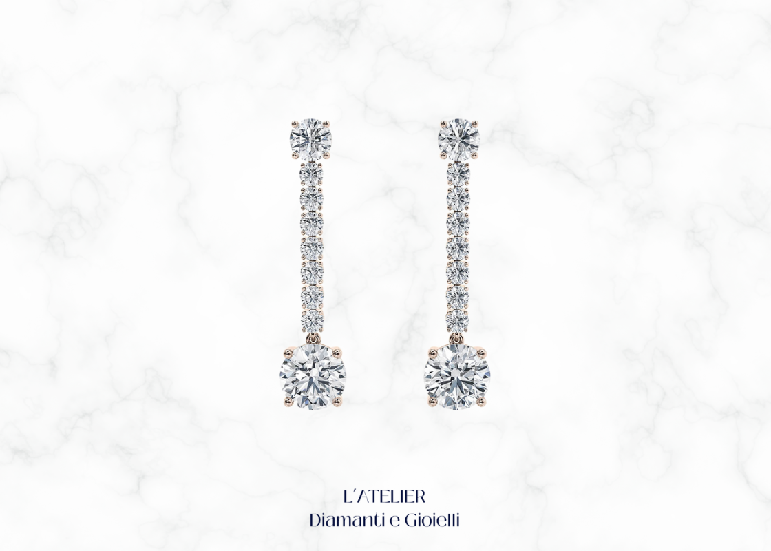 Eleganti orecchini pendenti in oro 18 carati con diamanti, che oscillano delicatamente. Gioielli di lusso e raffinatezza per ogni occasione.