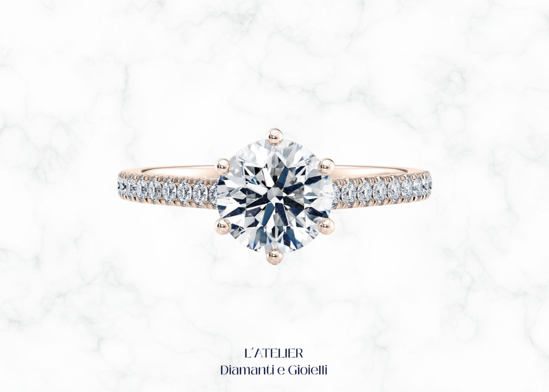 Elegante anello 'Luce Celeste' in oro 18 carati con diamante brillante, dal design luminoso che evoca una stella. Gioiello raffinato e scintillante