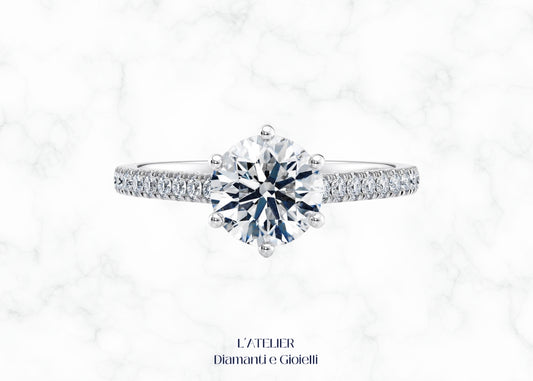 Elegante anello 'Luce Celeste' in oro 18 carati con diamante brillante, dal design luminoso che evoca una stella. Gioiello raffinato e scintillante