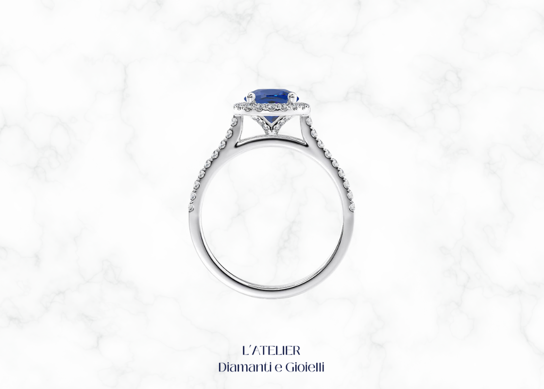 Anello in oro con zaffiro naturale e diamanti a contorno halo. L'Atelier Diamanti e Gioielli Roma.