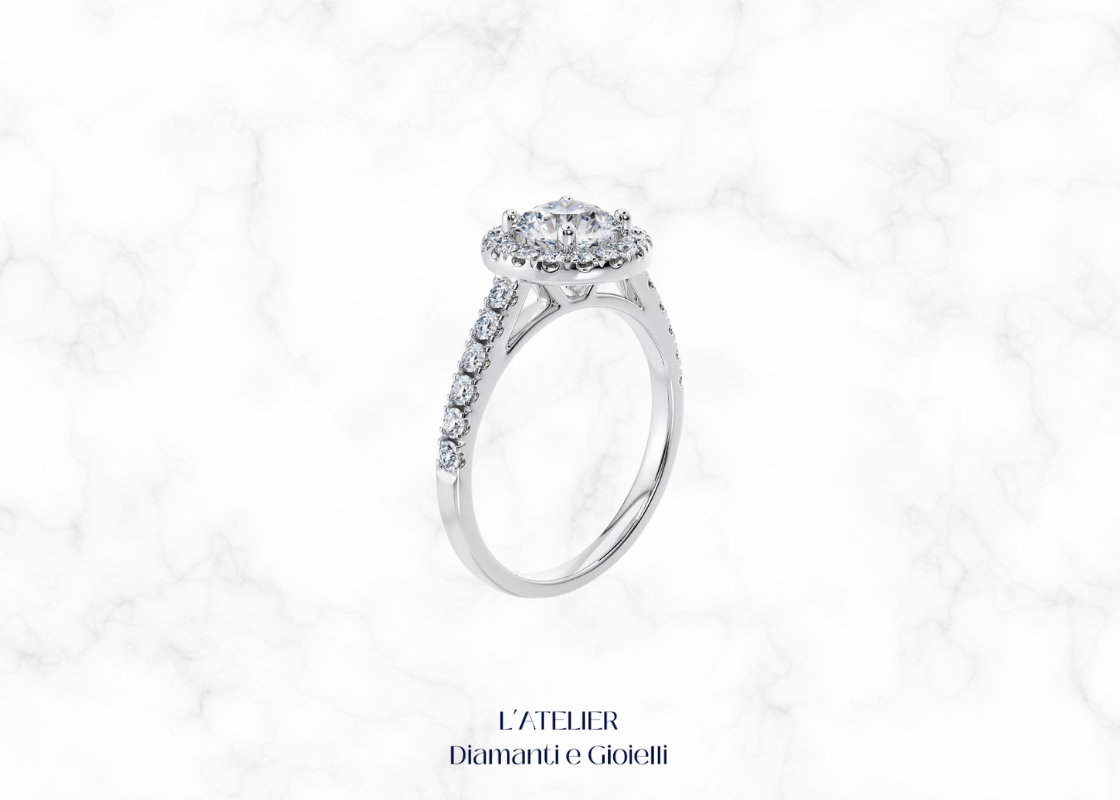 Anello Solitario Halo rotondo in Oro 18kt con Diamante Centrale e Pavé sul Gambo, gioiello di fidanzamento certificato Atelier Diamanti.