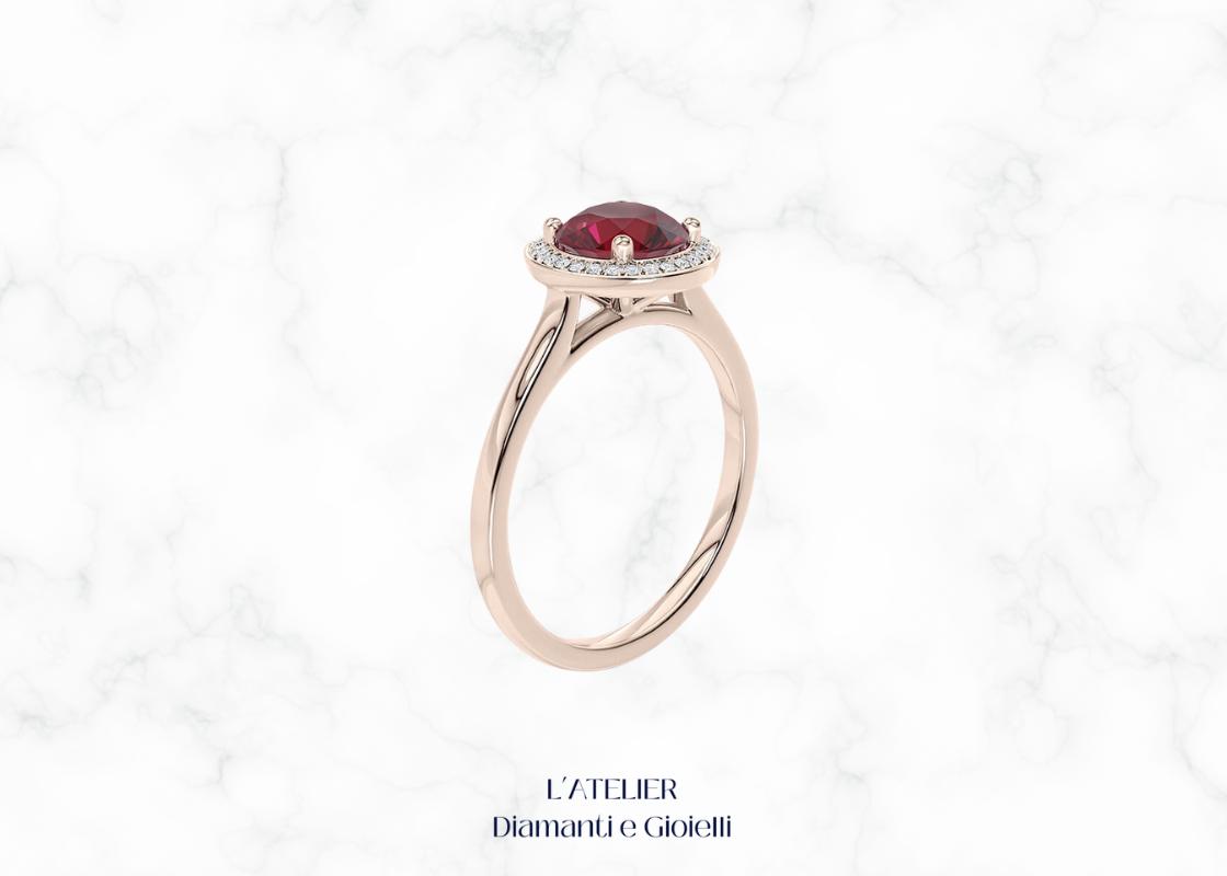 Anello di fidanzamento Halo in Oro 18kt con Rubino Naturale centrale rotondo e contorno di Diamanti Naturali.