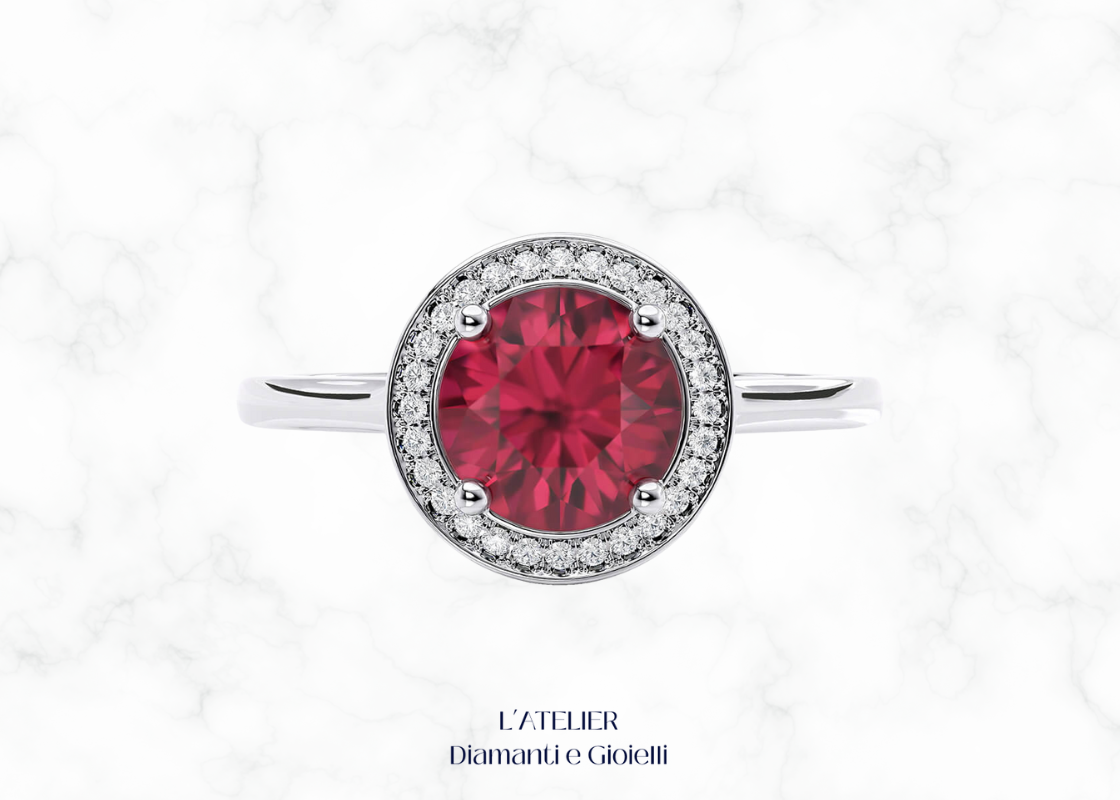 Anello di fidanzamento Halo in Oro 18kt con Rubino Naturale centrale rotondo e contorno di Diamanti Naturali.