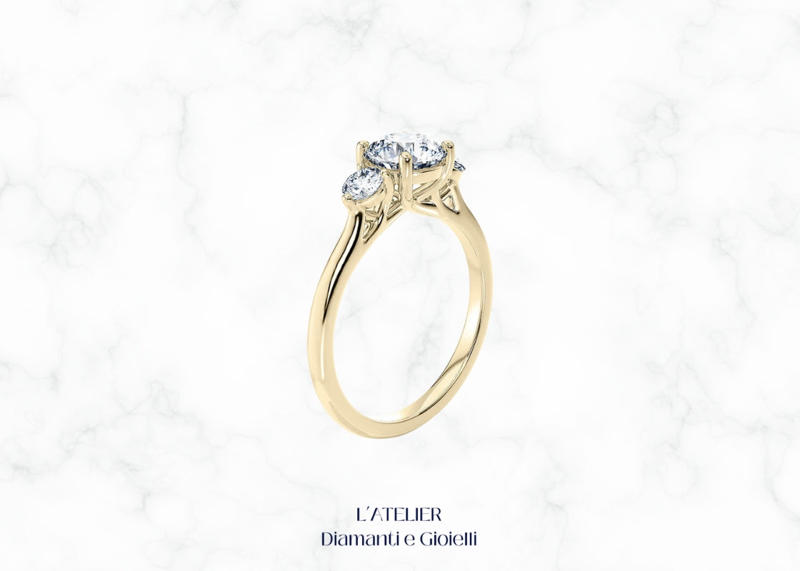 Lussuoso anello Trilogy 'Aurora' in oro 18 carati con tre diamanti brillanti allineati. Gioiello simbolo di passato, presente e futuro, ideale per un fidanzamento o anniversario.