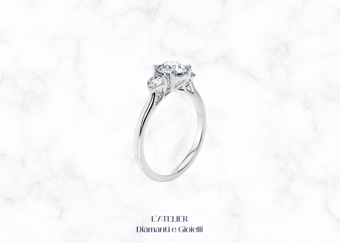 Lussuoso anello Trilogy 'Aurora' in oro 18 carati con tre diamanti brillanti allineati. Gioiello simbolo di passato, presente e futuro, ideale per un fidanzamento o anniversario.