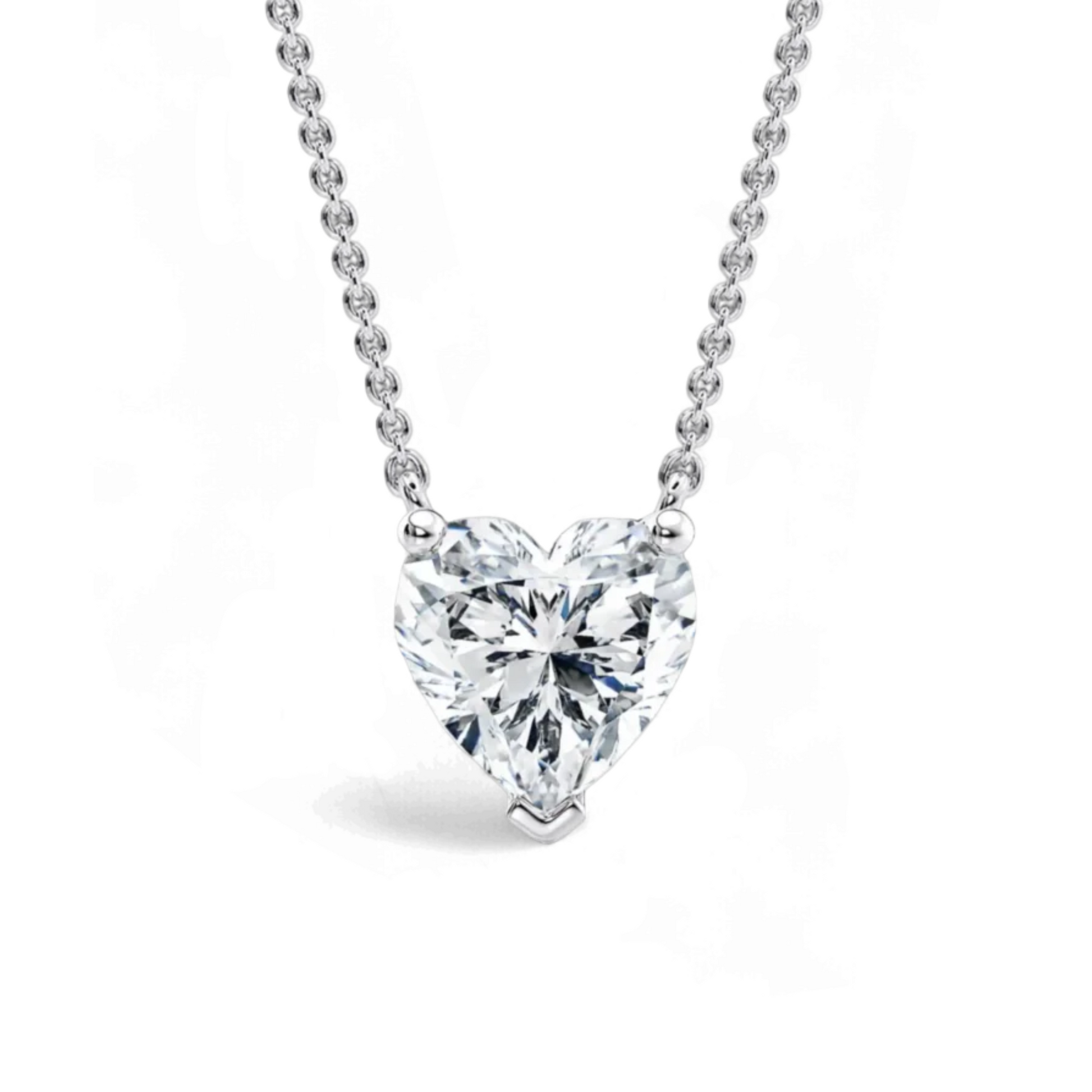 Elegante collana punto luce in oro 18 carati con un diamante a taglio cuore brillante. Gioiello romantico e simbolo d'amore
