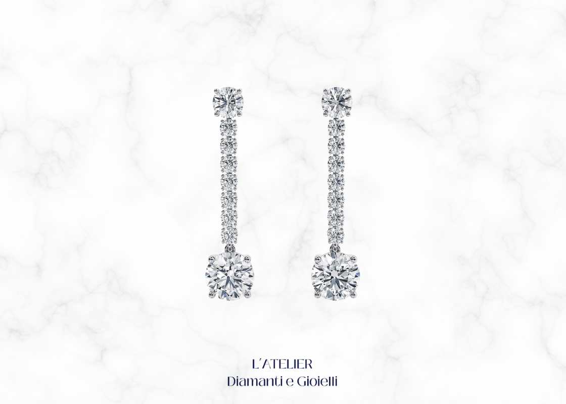 Eleganti orecchini pendenti in oro 18 carati con diamanti, che oscillano delicatamente. Gioielli di lusso e raffinatezza per ogni occasione.