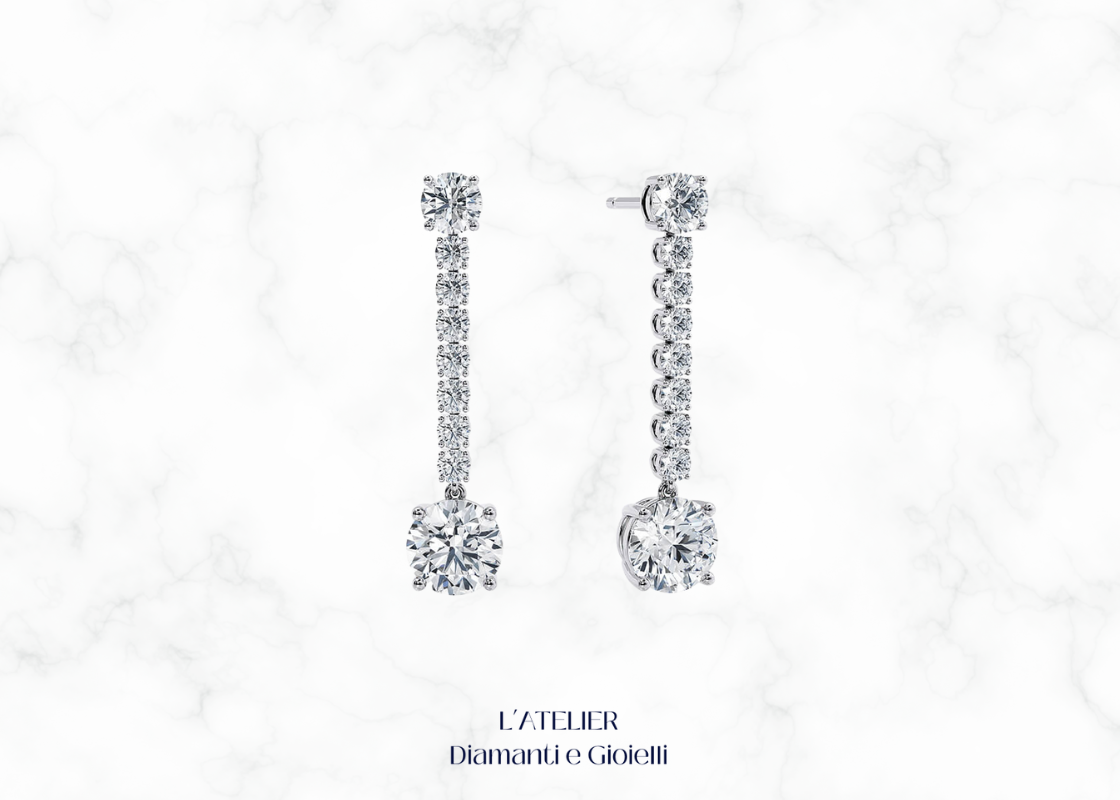 Eleganti orecchini pendenti in oro 18 carati con diamanti, che oscillano delicatamente. Gioielli di lusso e raffinatezza per ogni occasione.