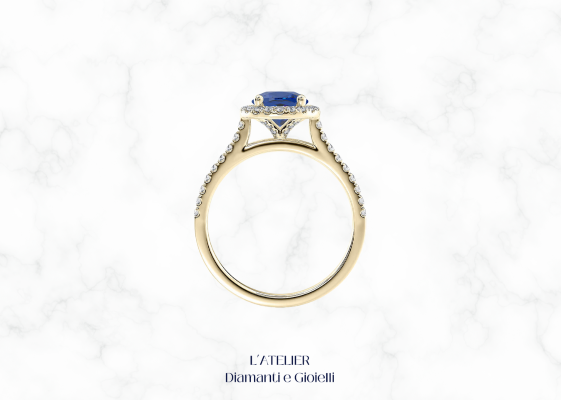 Anello in oro con zaffiro naturale e diamanti a contorno halo. L'Atelier Diamanti e Gioielli Roma.