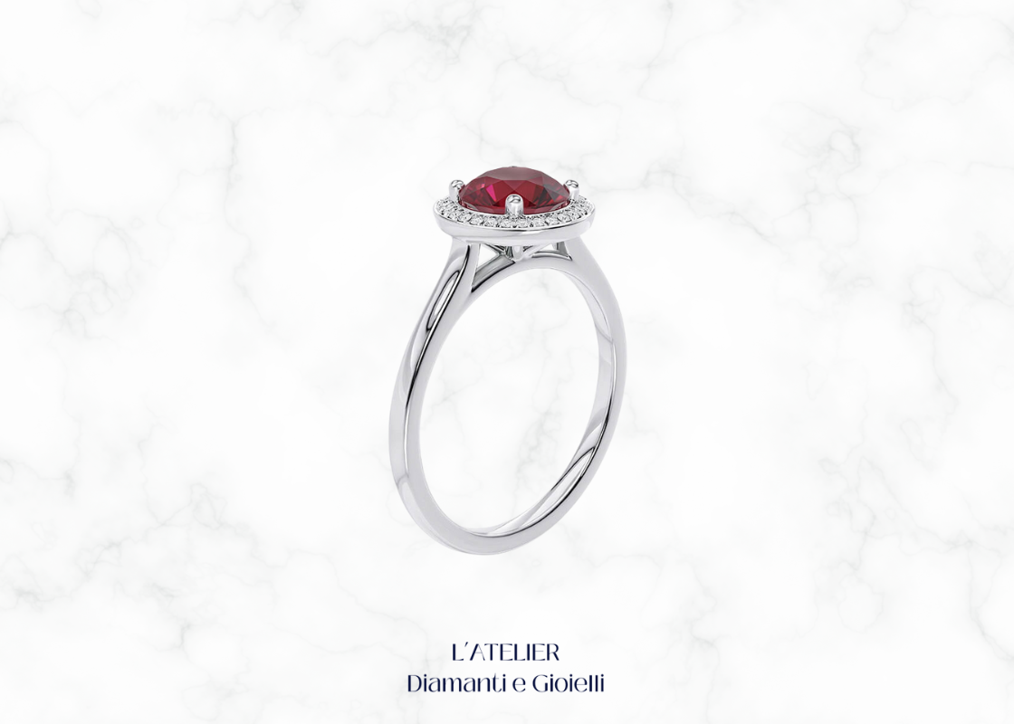 Anello di fidanzamento Halo in Oro 18kt con Rubino Naturale centrale rotondo e contorno di Diamanti Naturali.