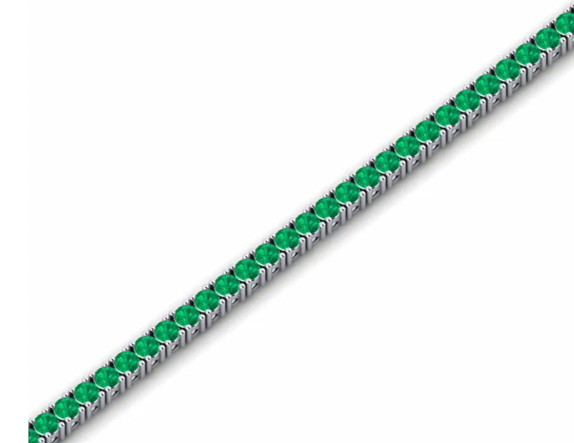 Bracciale tennis con smeraldi verdi e altre pietre preziose, su sfondo scuro. Gioiello di lusso con smeraldi di Atelier Diamanti e Gioielli