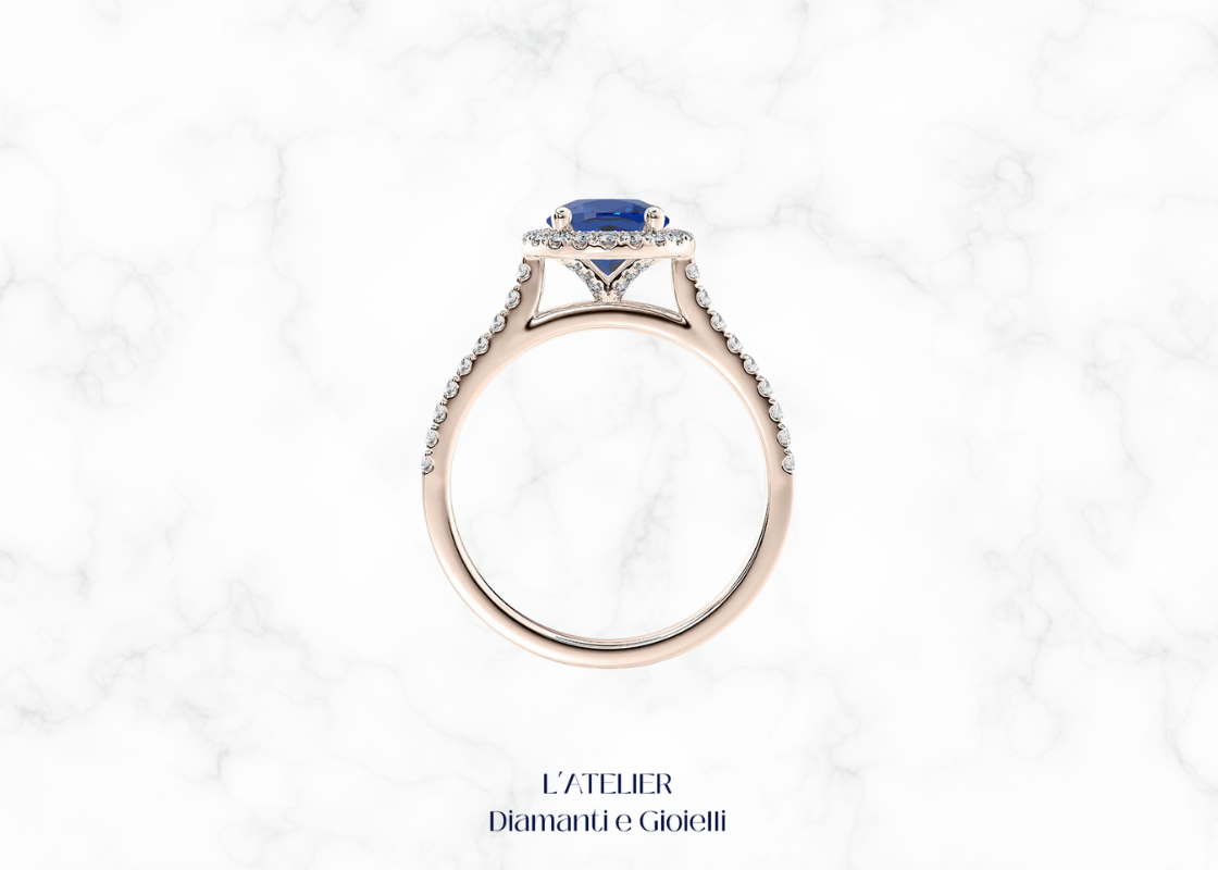 Anello in oro con zaffiro naturale e diamanti a contorno halo. L'Atelier Diamanti e Gioielli Roma.